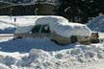 car buried in snow